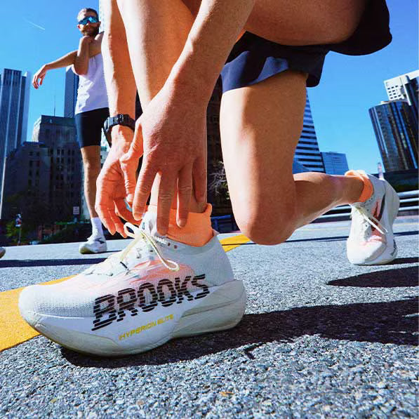 A closeup of a woman wearing running shoes